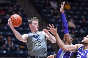 Sean McNeil scores 16 to lead No. 10 West Virginia past Kansas State